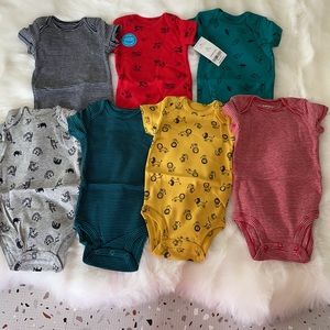 New with tags Carter's 7 piece baby bodysuit